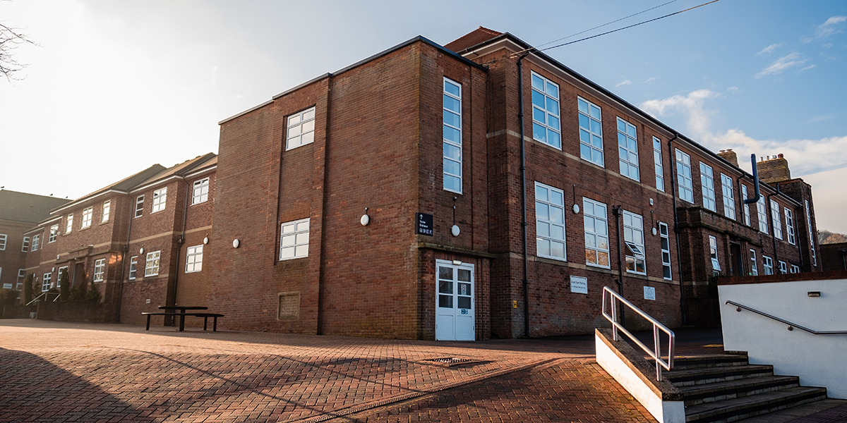 Photo of the corner of the main college building